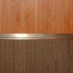 rivestimento parete in porfido e faggio